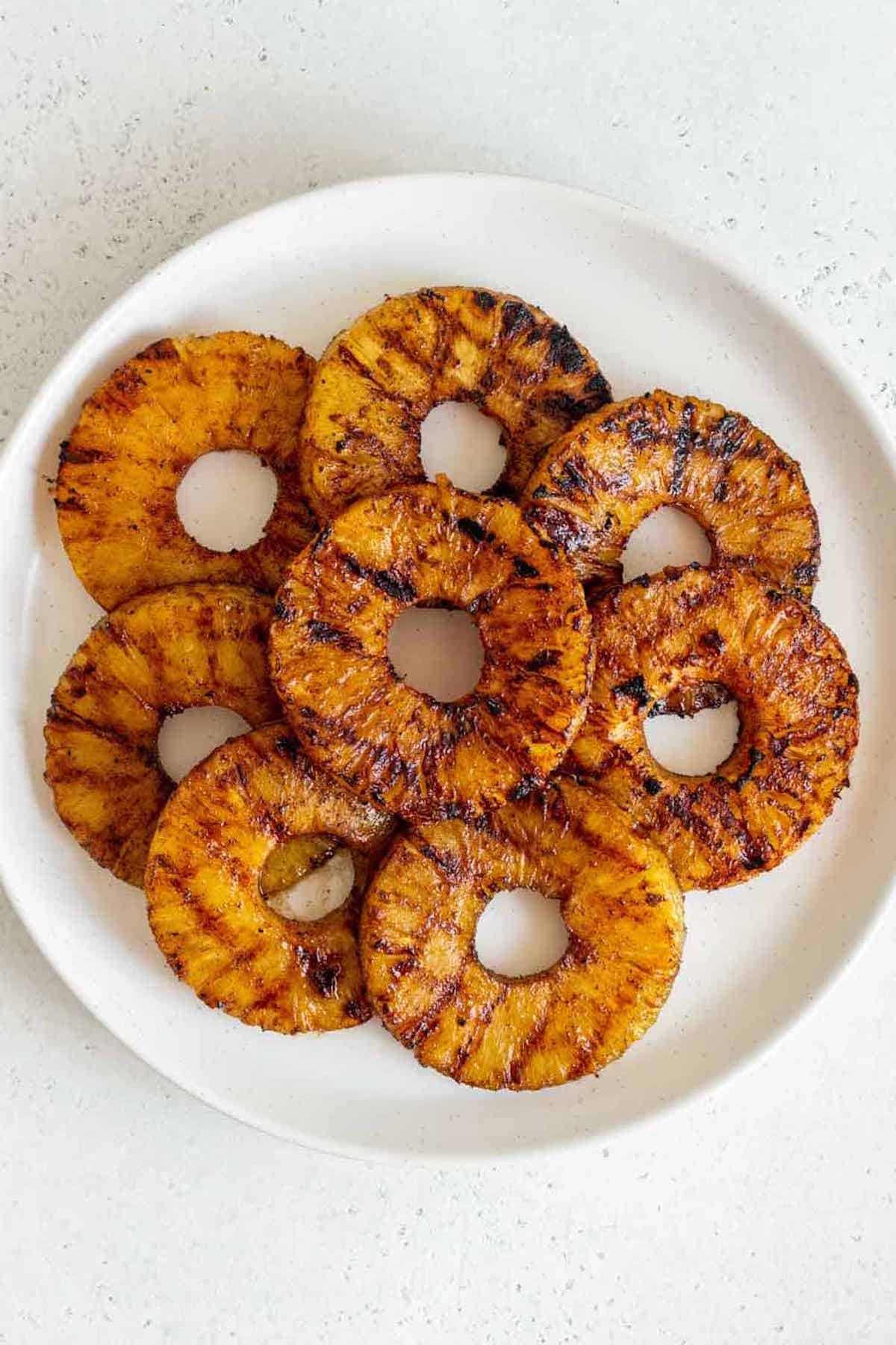 plate of grilled pineapple rings