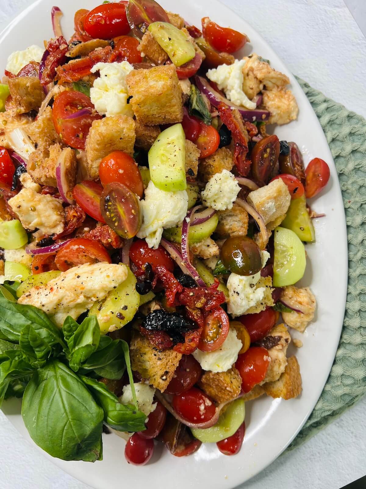 panzanella toscana on a large white oval dish