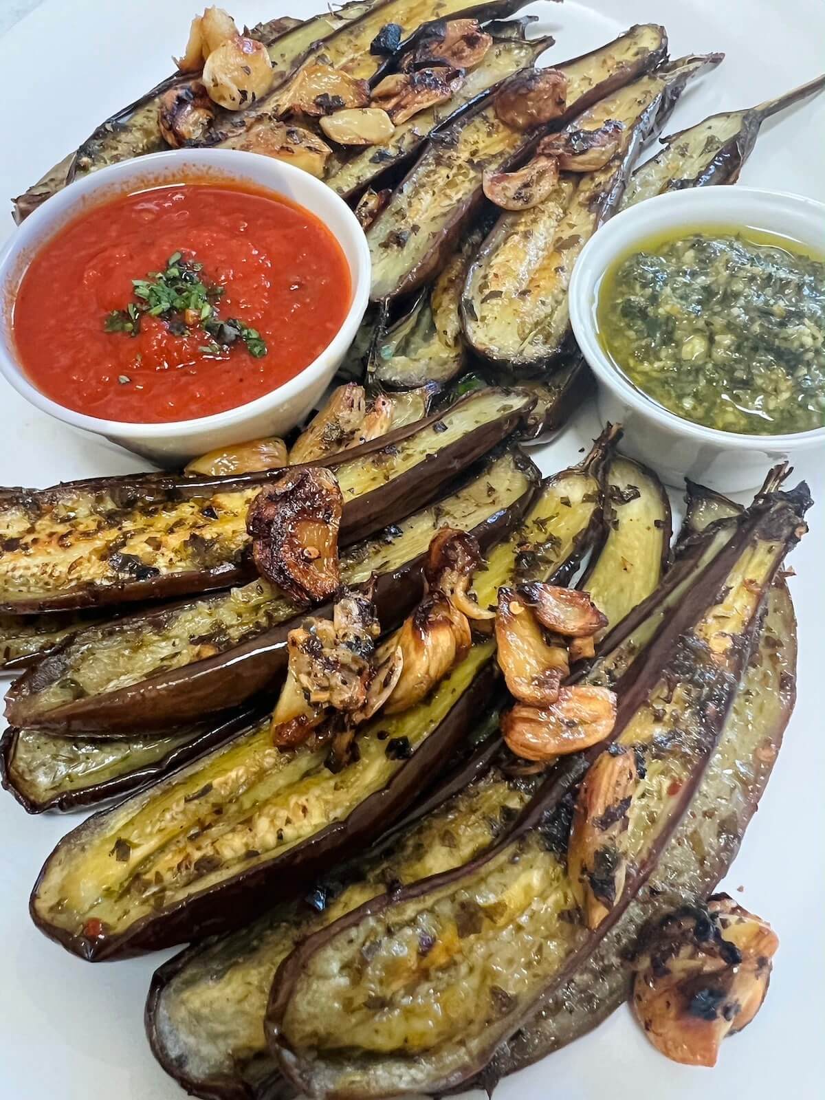 roasted baby eggplant on a serving tray