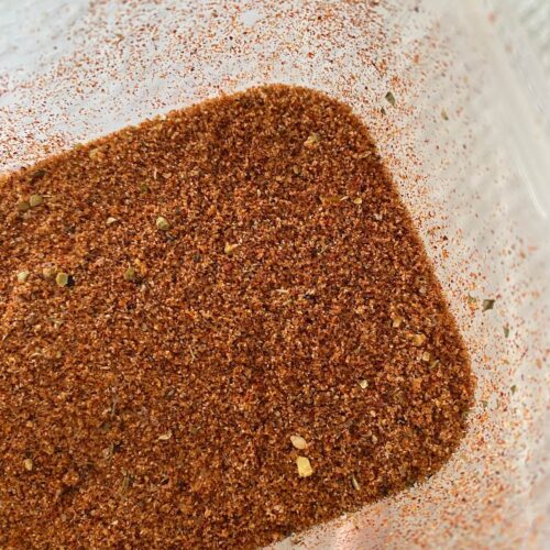 pork dry rub in a clear container
