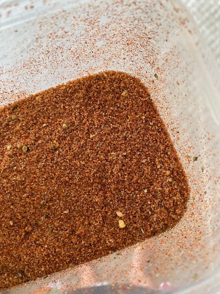 pork dry rub in a clear container