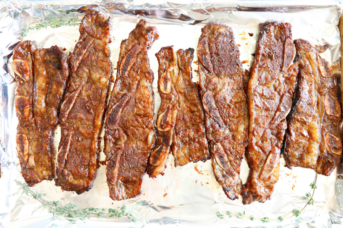 foil covered tray lined with short ribs.