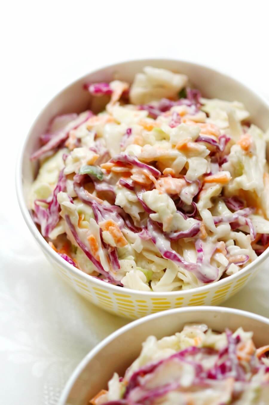 two small bowls of classic american coleslaw.