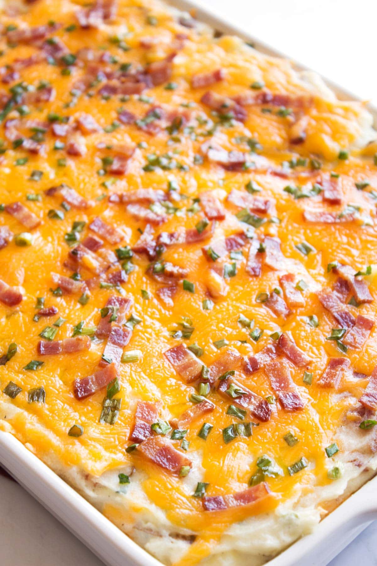 close up of potato bake in a serving dish.