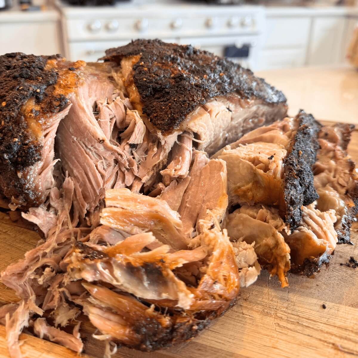 oven smoked pork butt roast, shredded.