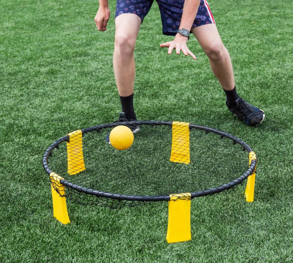 man playing spikeball.