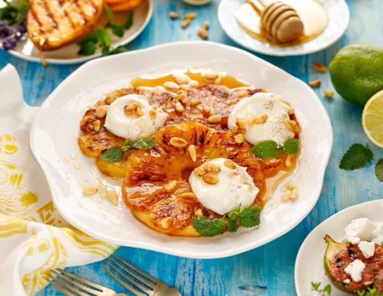 Grilled pineapple with ice cream dessert.